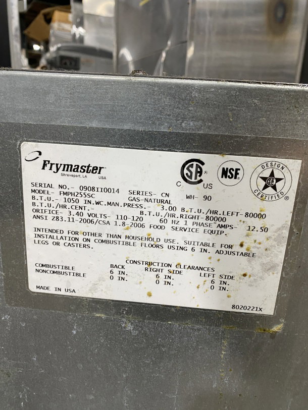 Frymaster FMPH255SC commercial stainless steel dual deep fat fryer with dumping station, backsplash, filter system, on casters.