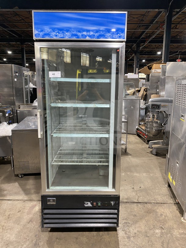 Kelvinator Commercial 28" display freezer, model KCGM24FB, with bottom mount compressor, poly-coated rack, on casters.