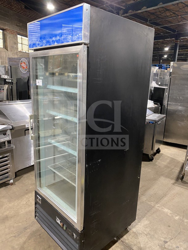 Kelvinator KCGM24FB 28" display freezer, swinging glass door, bottom mount compressor, poly-coated racks, on casters.