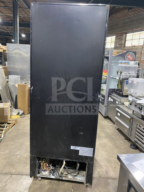 Kelvinator KCGM24FB commercial display freezer, 28", swinging door, bottom mount compressor, on casters, 115V.