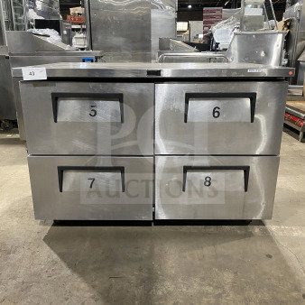 True TUC-48F-D-4-HC undercounter freezer, stainless steel, 4 drawers, marble worktop, up-turned splash, on casters, 115V 1 phase.