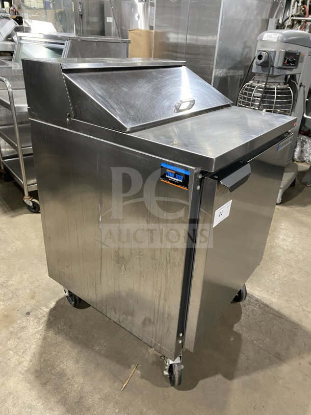 Beverage Air stainless steel refrigerated sandwich prep table, SPE27HCB model, with single door storage, poly rack, on casters.