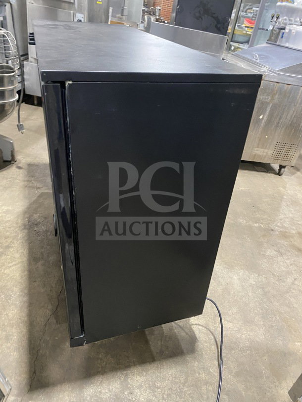 Vitlife Commercial Black Three-Door Glass Swing Door Back Bar Cooler on casters. Model VBBT-338H, chrome plated rack.