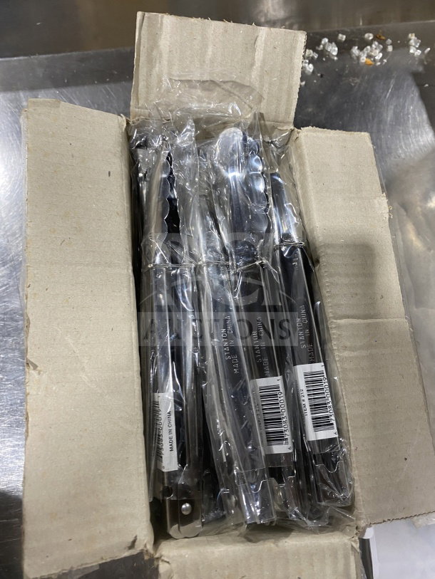 Stanton 9" stainless steel scalloped utility tongs, new in box, set of 12. Features "Made in China" label.