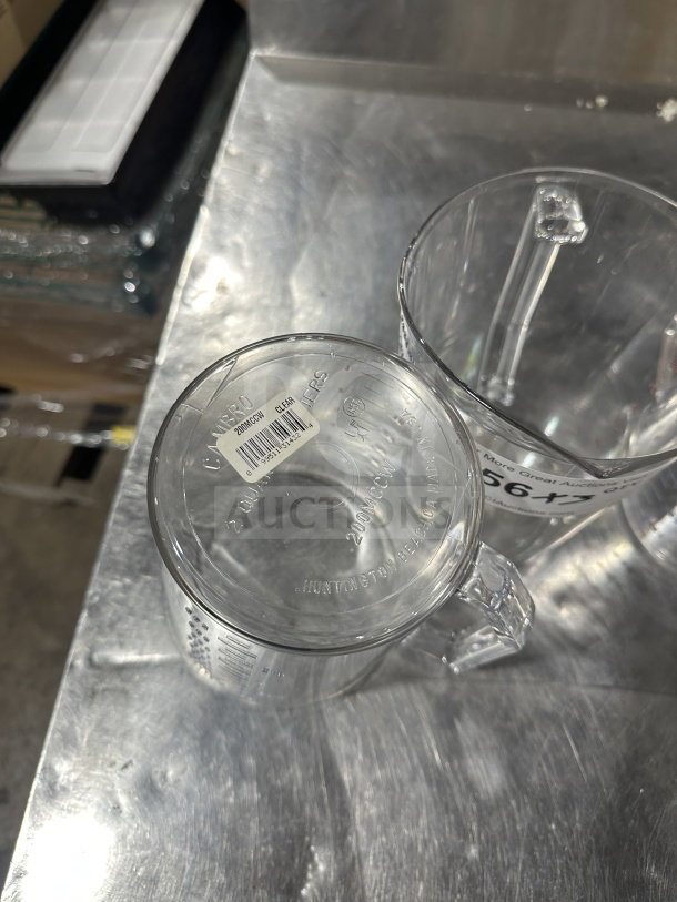 Cambro Camwear 2-quart clear polycarbonate measuring cup, commercial grade, visible label with measurement markings.