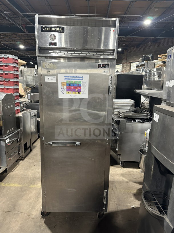Continental stainless steel single-door electric freezer, model 1FE-SA, with poly-coated rack, on casters, 115V, used condition.