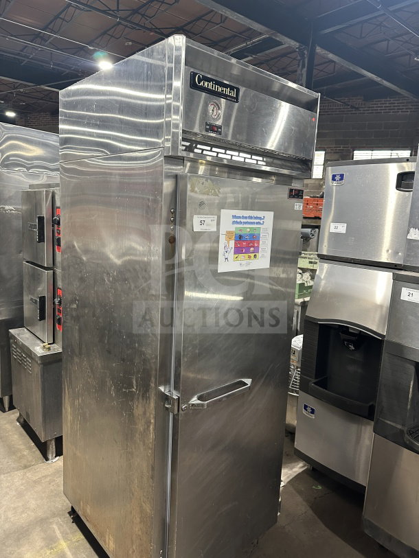 Continental stainless steel single-door electric freezer, model 1FE-SA, on casters, poly coated wired rack, 115V, working condition.