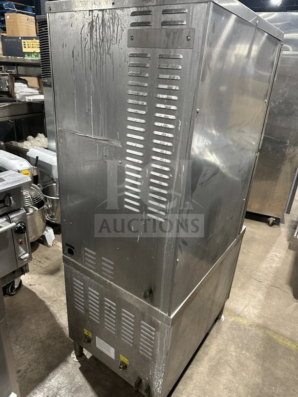 Vulcan C24GA10 commercial stainless steel gas convection steamer cabinet, on legs, in used condition.