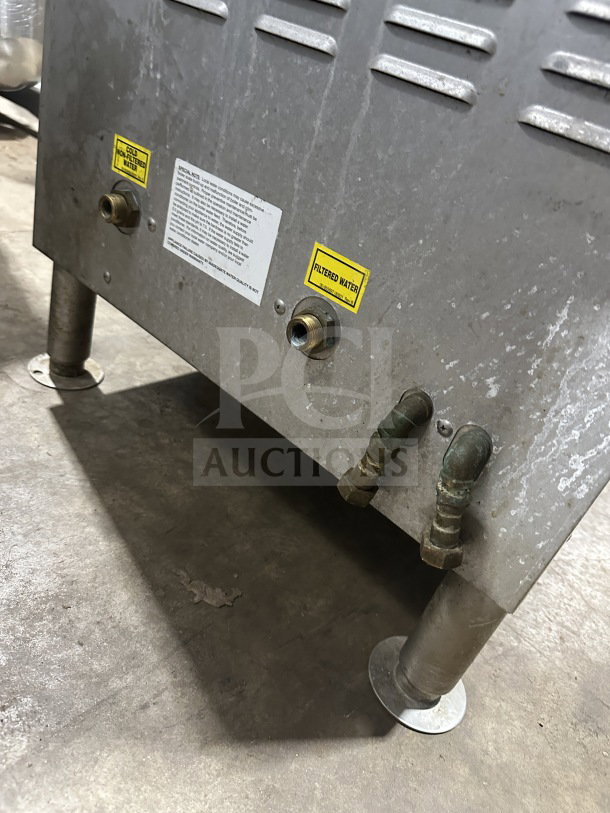 Vulcan C24GA10 gas convection steamer, dual cabinet, stainless steel, on legs, visible water connections, tags indicate filtered water intake.