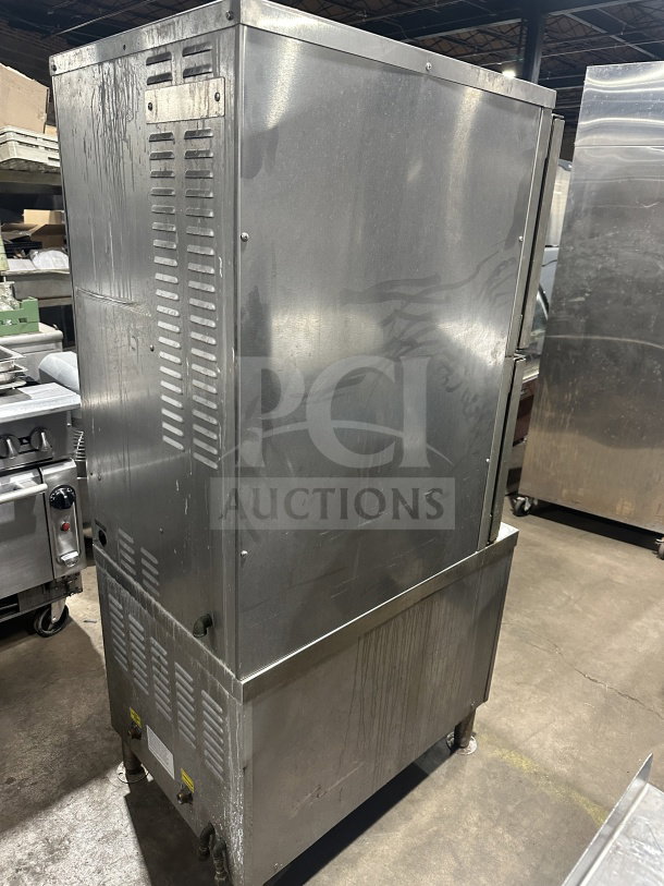 Vulcan C24GA10 commercial stainless steel gas convection steamer with dual cabinets, model C24GA10, on legs, used condition.