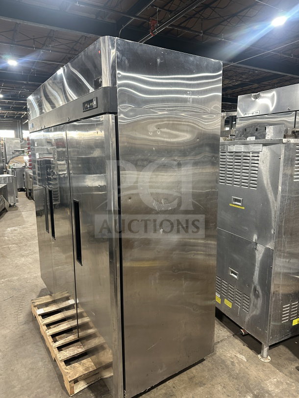 Turbo Air M3 Series 3-door stainless steel commercial freezer, model M3F723, with poly-coated rack, on pallet.