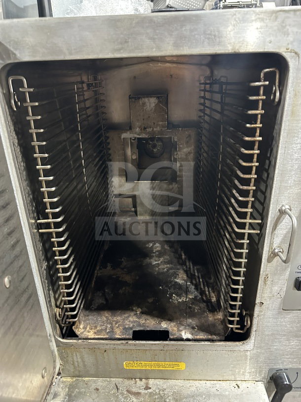 Cleveland SteamChef Series stainless steel countertop 6-pan convection steamer, electric, 208V 3 Phase. Moderate wear.