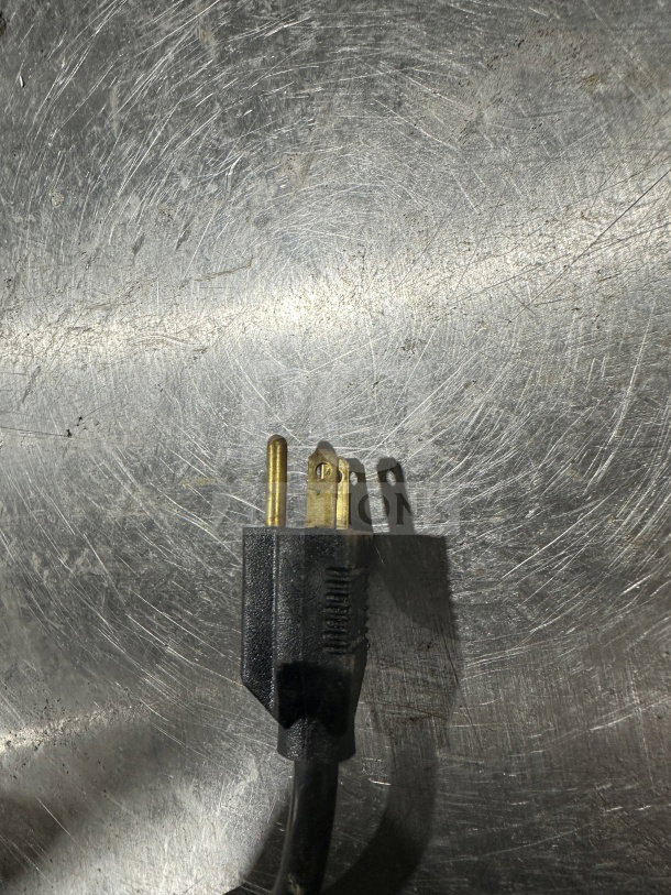 Power plug for Cleveland Range SteamChef commercial countertop steamer, 208V 3 phase, shown on a scratched stainless steel surface.