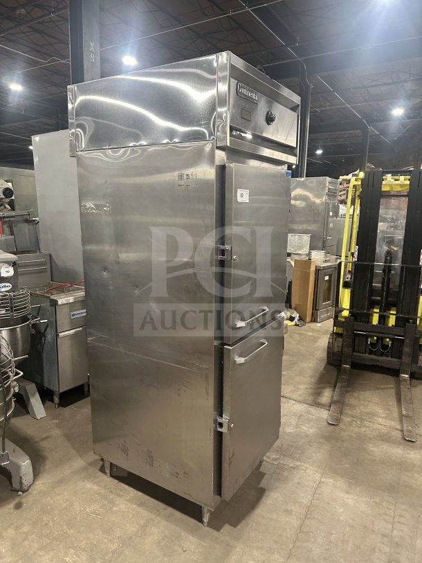 Cleveland Continental DL1WE-HD stainless steel 2-door heated holding cabinet, Energy Star certified, on legs, in good condition.