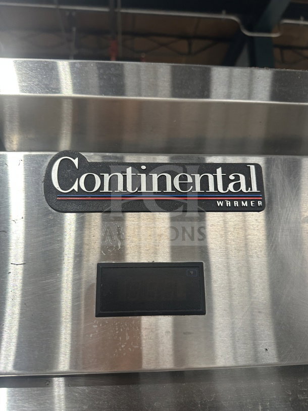 Continental Commercial Stainless Steel 2-Door Heated Holding Cabinet, Model DL1WE-HD, Energy Star Certified, on legs, visible brand label.