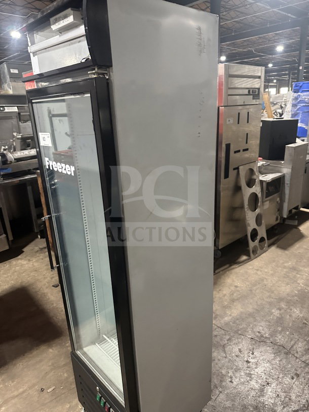 Cleveland SD240 gelato merchandiser freezer, black with a glass swing door, LED light, door heater, wire racks, in a working condition.