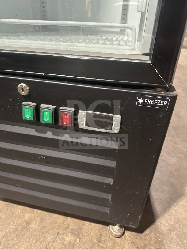 Cleveland SD240 gelato style freezer with single glass door, door heater, LED light, poly coated racks, and control panel.