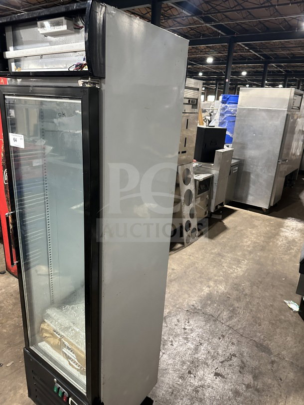 Commercial black gelato style merchandiser freezer, model SD240, with glass door, LED light, poly coated racks, and door heater.