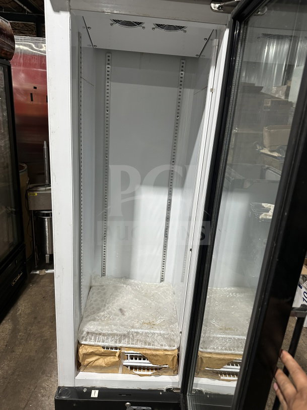Commercial black gelato-style freezer, Model SD240, with glass swing door, LED light, door heater, and wire racks.