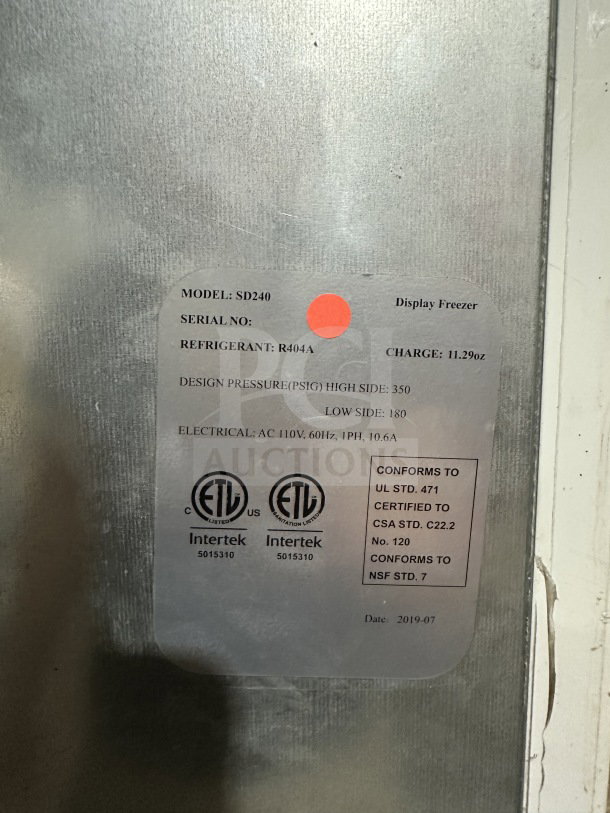 Commercial black gelato merchandiser freezer, model SD240, with door heater, LED light, poly racks. Label indicates refrigerant R404A.