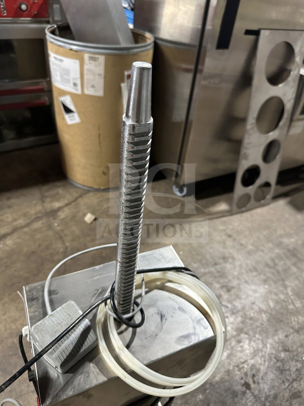 Commercial stainless steel electric sausage stuffer, countertop model with cords. Previously working, good condition.