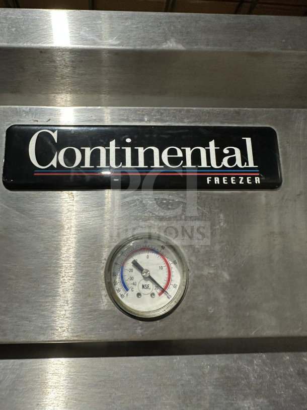 Continental Commercial Stainless Steel Reach-In Freezer, Model 1F, visible brand label, temperature gauge, sturdy condition.