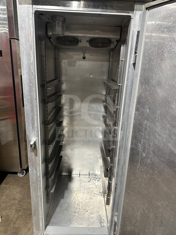 Continental Commercial Stainless Steel Reach-In Freezer, Model 1F, single solid door, on casters, interior shelving, used condition.