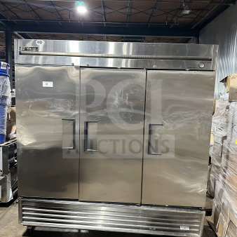 True T72-F commercial stainless steel 3-door reach-in freezer, with poly coated rack and casters, 115/208/230V.