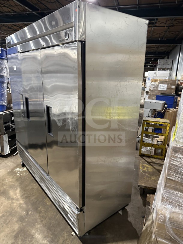 True T72-F commercial stainless steel 3-door reach-in freezer, with poly coated rack, on casters, model T72-F.