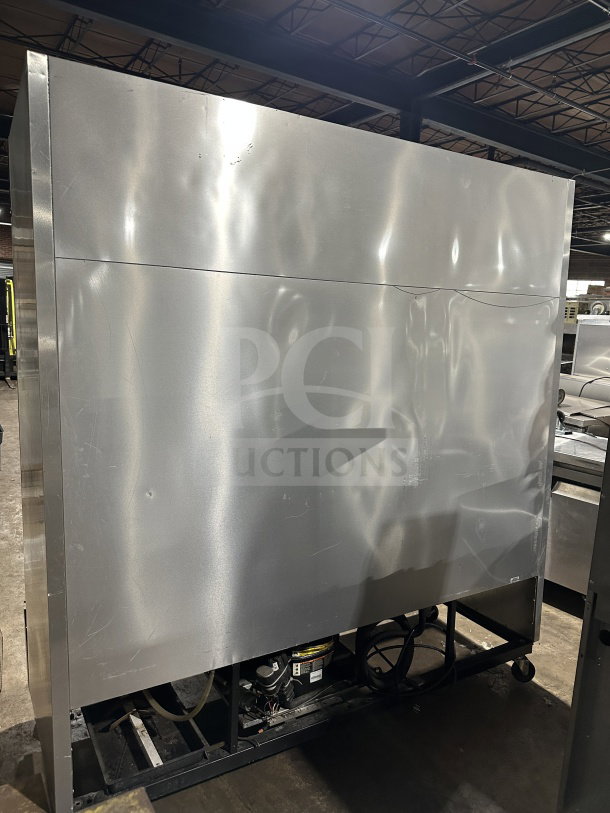 True T72-F commercial stainless steel 3-door reach-in freezer, equipped with a poly coated rack, mounted on casters, model number T72-F.