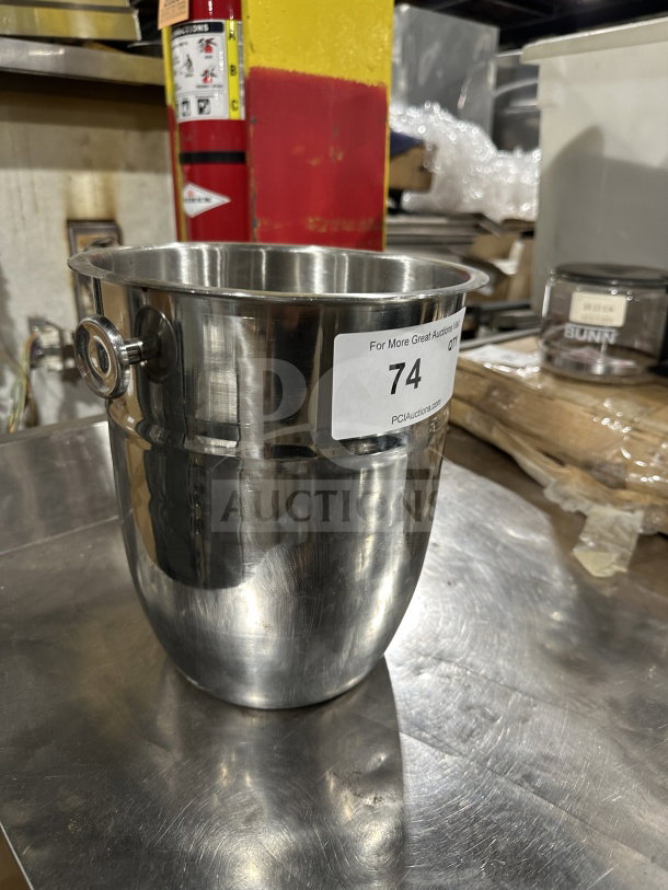 Commercial stainless steel wine bucket, champagne chiller with side handles. Minor wear visible. Auction tag marked "74".