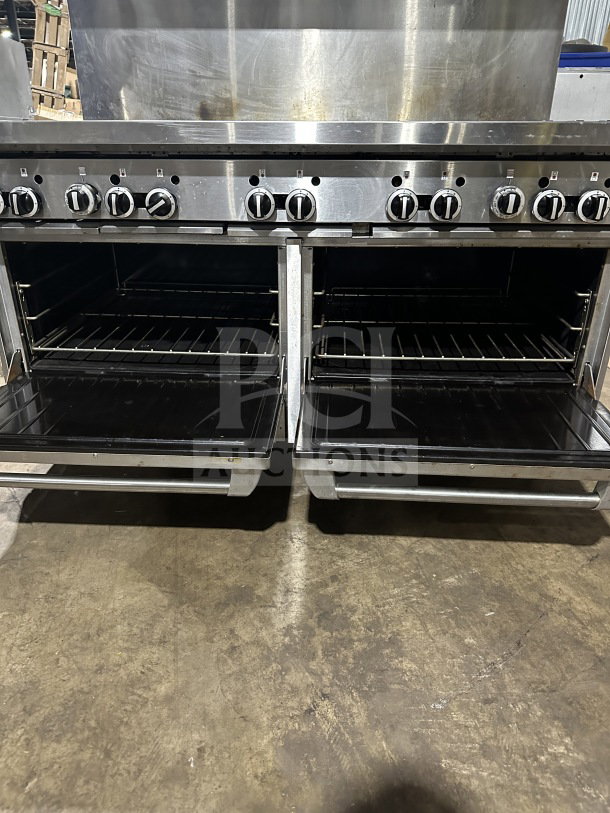 Garland commercial stainless steel 10-burner range with double oven, backsplash, and wired oven rack. Excellent condition.