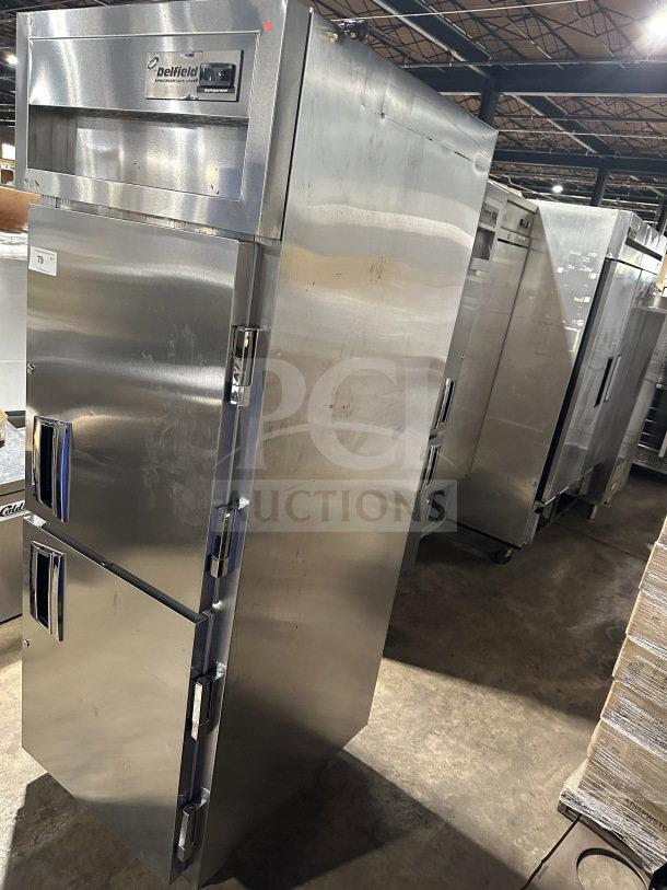 Delfield SSR1-SH-21 stainless steel reach-in refrigerator, three-section, commercial use, excellent condition.