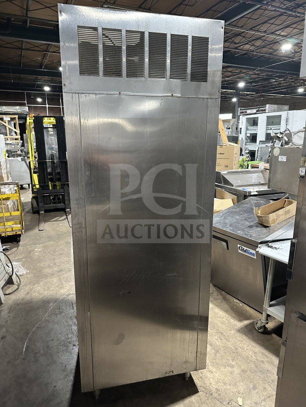 Delfield SSR1-SH-21 commercial stainless steel reach-in refrigerator, good condition, exterior ventilation panel visible.