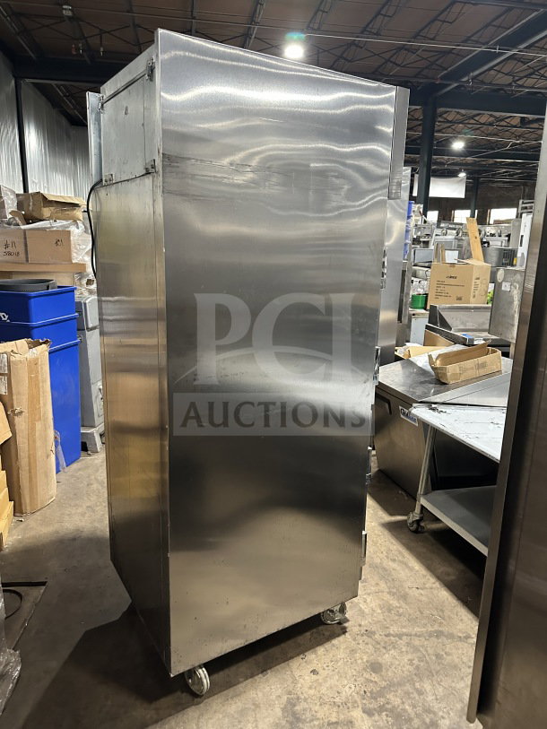 Delfield SSR1-SH13-21 stainless steel reach-in refrigerator, 2-door, 115V, on casters, excellent condition.