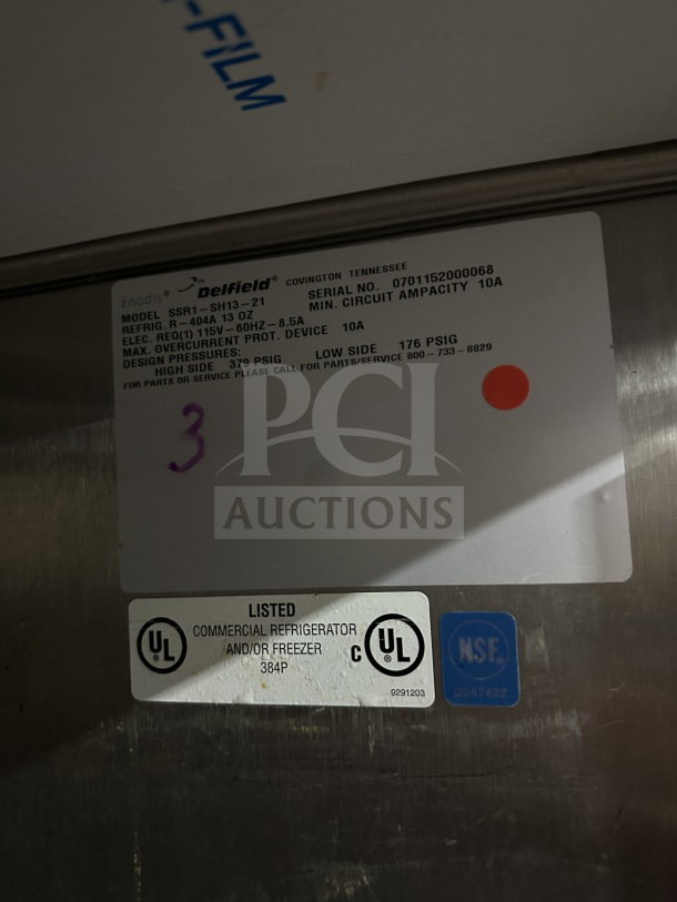 Delfield SSR1-SH13-21 commercial stainless steel refrigerator label; 115V, on casters, two-door, UL and NSF certified.