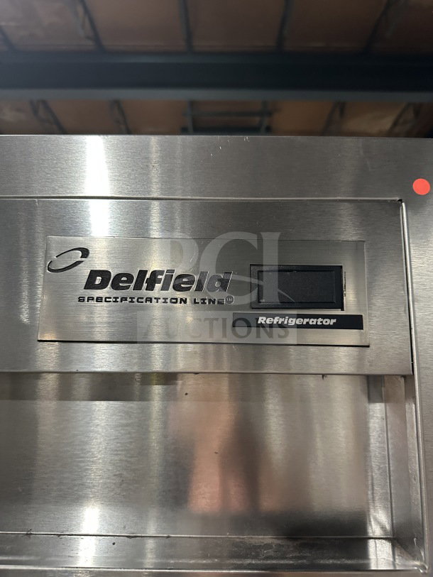 Delfield SSR1-SH21 commercial stainless steel 2-door reach-in refrigerator, 115V, on casters.