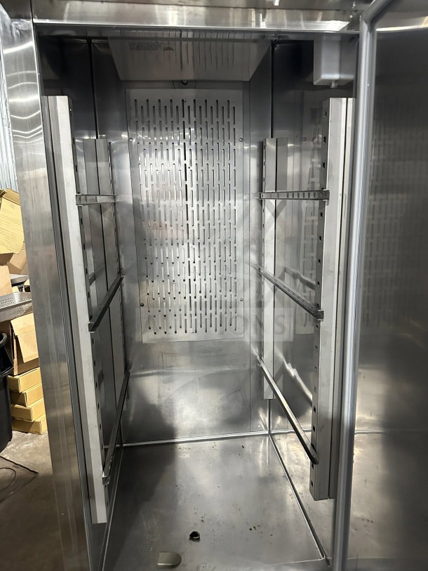 Avantco 178SS1FHC stainless steel single door reach-in freezer, interior view, on casters, used condition, 115V.