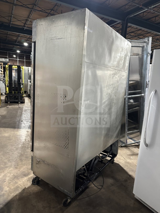 True T-49 Commercial Stainless Steel 2-Door Refrigerator, Energy Star Certified, on casters, model SN: 7010533.