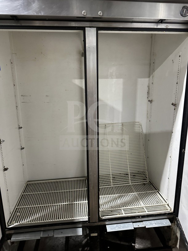 True T-49 commercial refrigerator, stainless steel, Energy Star certified, poly coated wire racks, on casters, 115V.