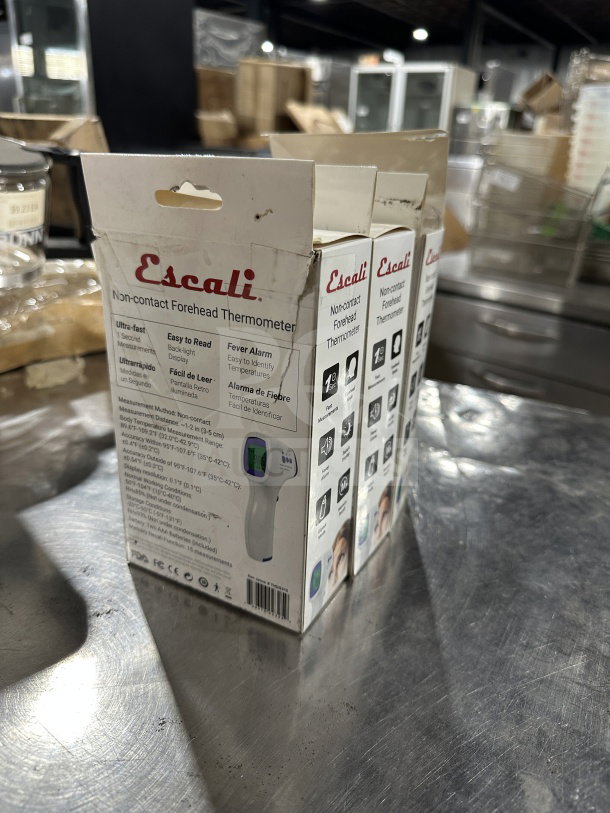 Brand new Escali THDG310 non-contact forehead thermometer in box, ultra-fast reading, back-light display, fever alarm.