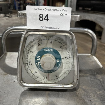 Taylor Commercial 5 lb. stainless steel food portioning scale, model 7855, featuring a clear dial. Used condition.