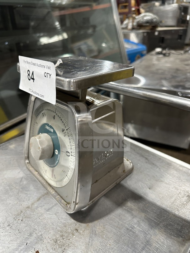 Taylor Commercial Stainless Steel 5 lb. Food Portioning Scale, analog display, minor wear, sturdy construction.