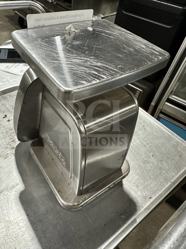 Taylor commercial stainless steel 5 lb. food portioning scale, durable build, lightly used condition, visible Taylor logo.