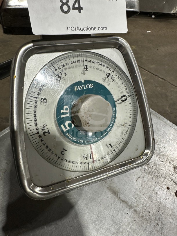 Taylor Commercial Stainless Steel 5 lb. Food Portioning Scale, Model T55. Shows signs of use. Clear dial display for accuracy.