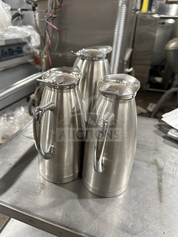 Bon Chef stainless steel vacuum-insulated beverage servers, commercial grade, excellent condition, polished finish, with lids.