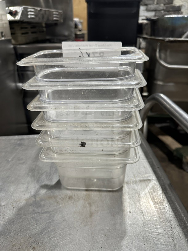 Vicor polycarbonate translucent food pan, stack of 6, full-size, used condition, visible auction label, ideal for commercial use.