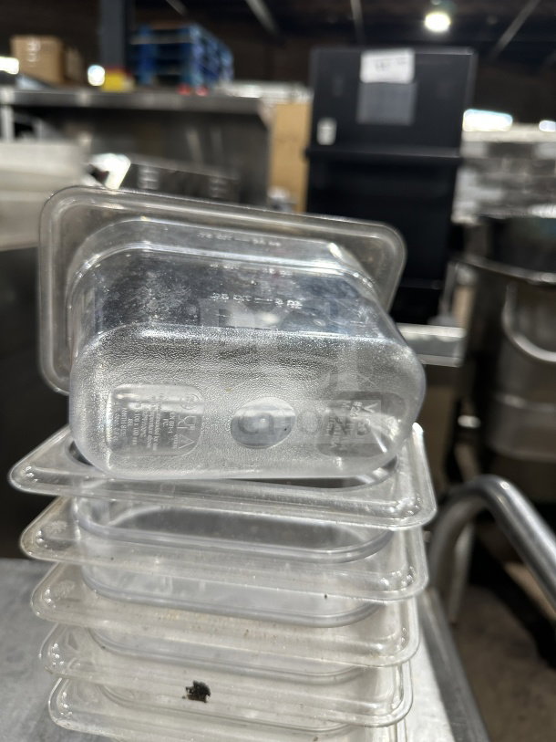 Vicor polycarbonate translucent food pan, stack of several, full size, visible markings, used condition.
