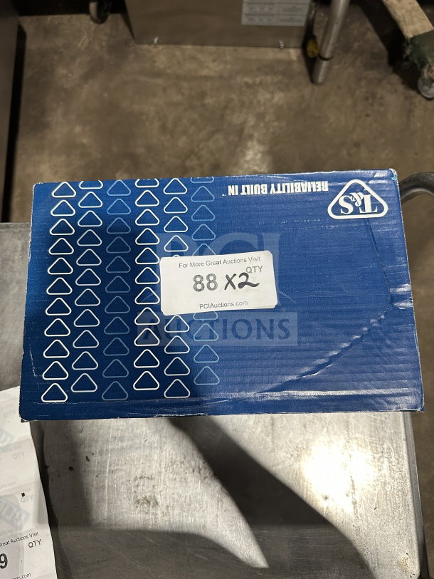 New T&S Model B-0155 commercial 6" add-on faucet, lever handle, in original packaging. Box displays T&S logo.