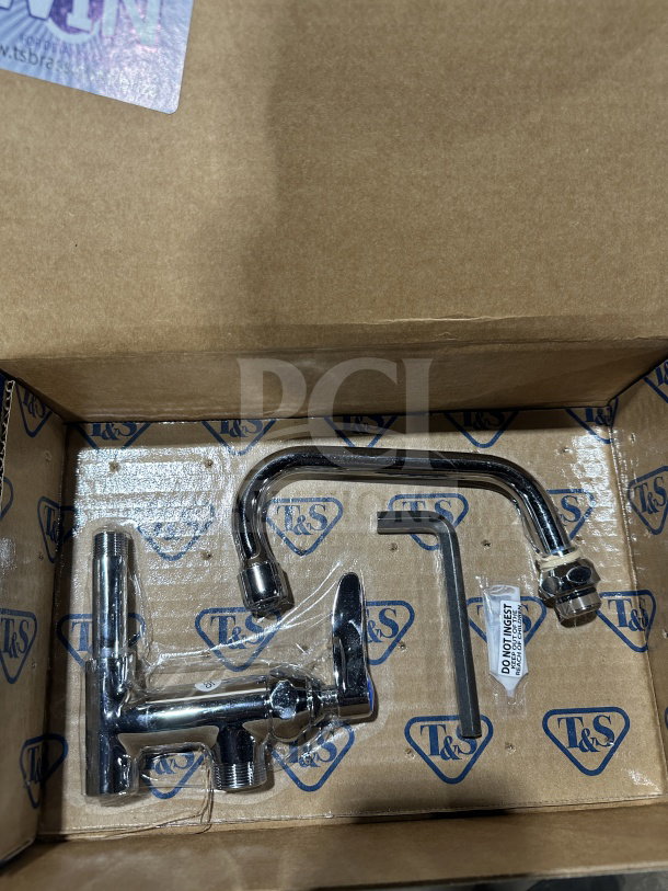 Brand new T&S Model B-0155 commercial 6" add-on faucet with lever handle, in original packaging.